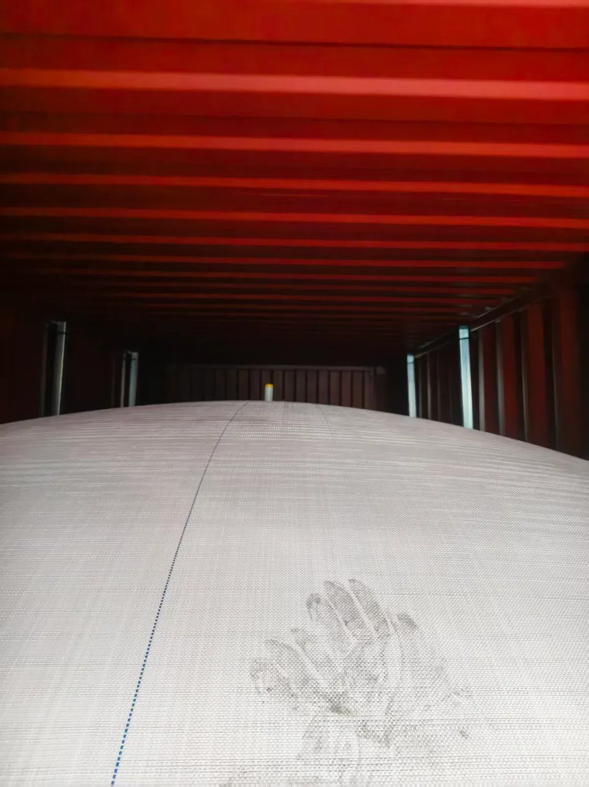 DOTP flexibag fully loaded and ready for shipment — container doors open showing filled flexitank
