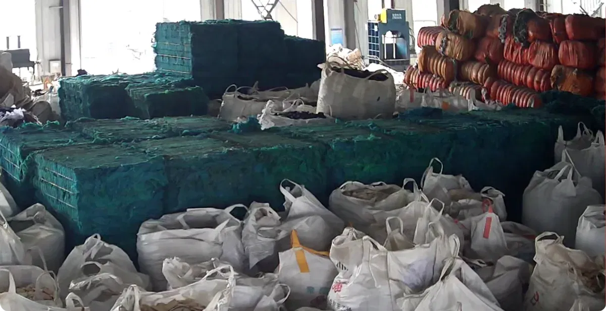 Waste PET recycling raw material piles at Shandong Changxing DOTP production facility